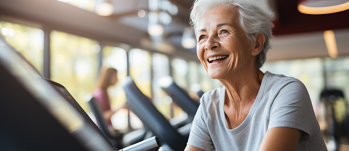 Older woman working out in gym