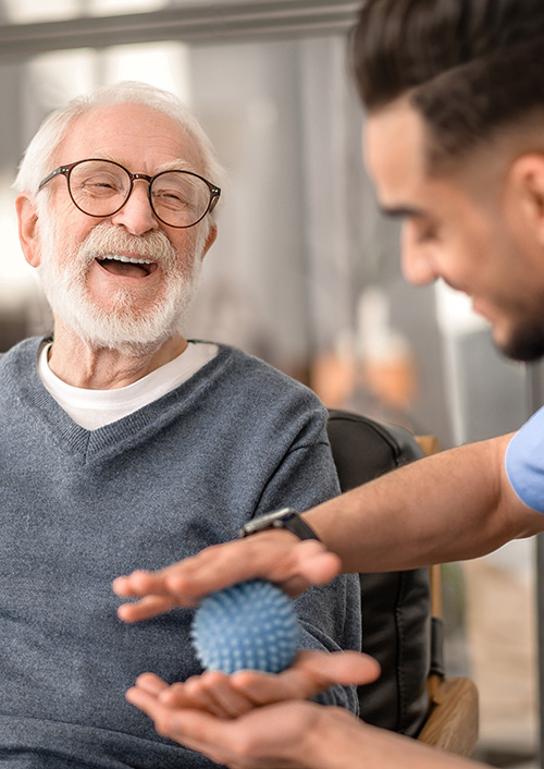 Elder gentleman getting physical therapy