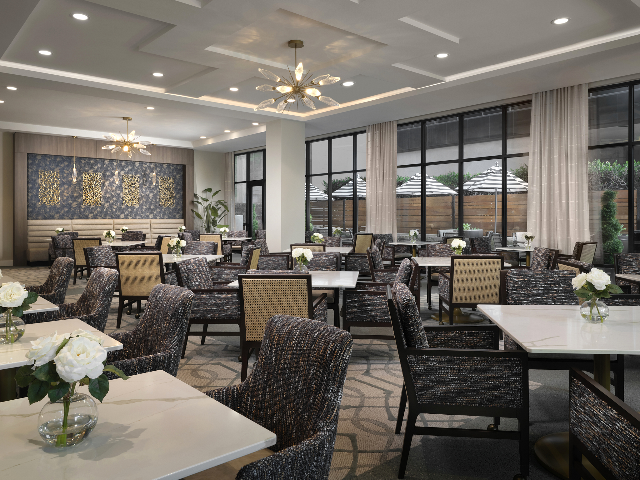 the dining room at The Vered, completed with artwork and window views